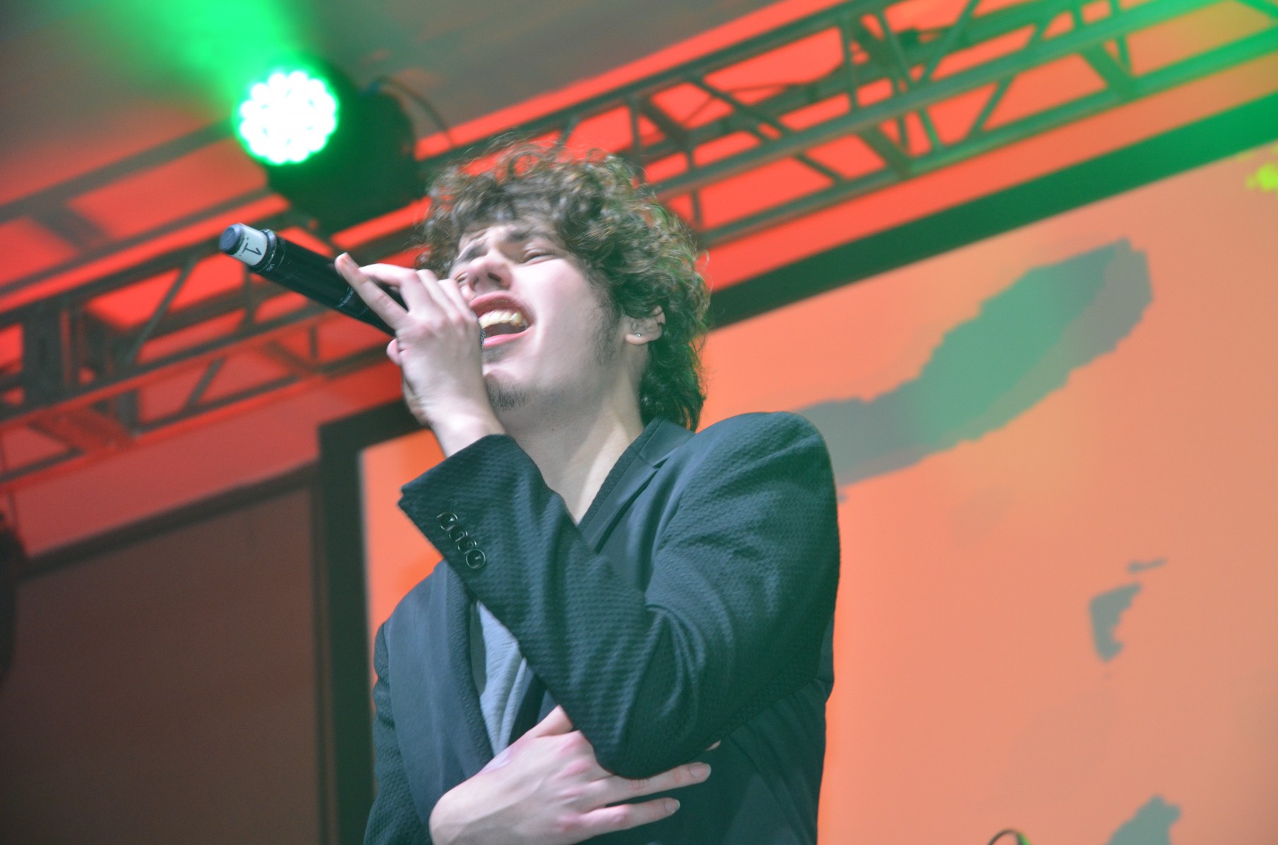 Garrett Gardner of "The Voice" belts one out in the Empire Ballroom on Sunday night.