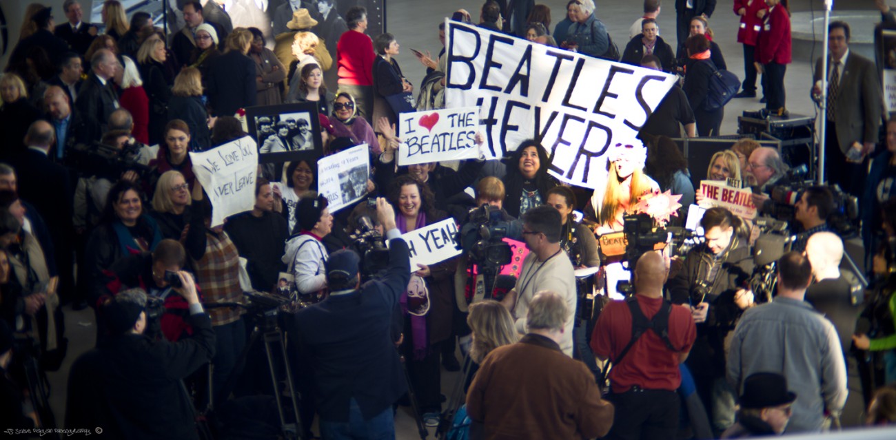 The media captures the frenzied Fest fans at JFK.